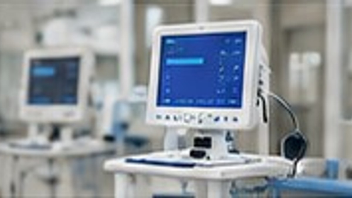 Medical device sales professional reviewing employer training questions before an interview